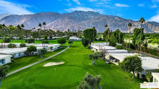 surrounding community featuring a mountain view