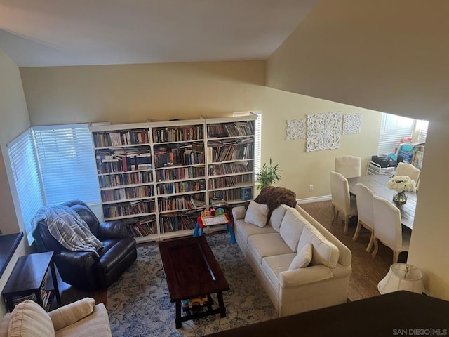 living room with vaulted ceiling