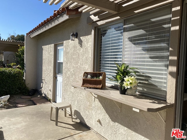 view of patio / terrace featuring a pergola