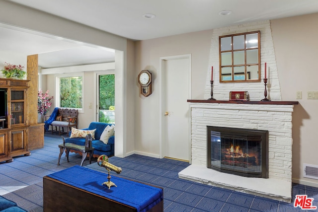 living room with a fireplace