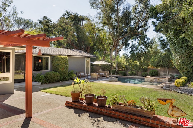 view of yard featuring a swimming pool with hot tub, a pergola, and a patio