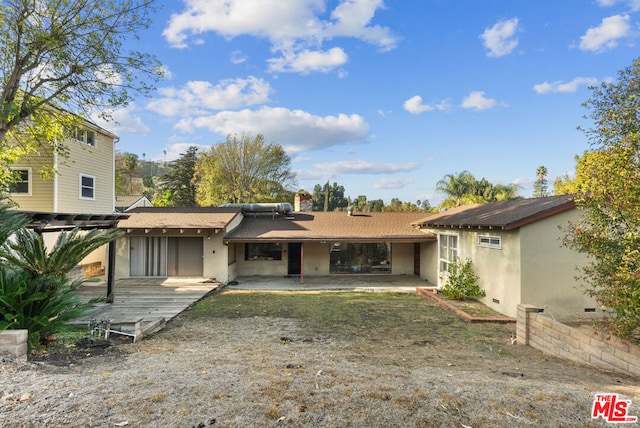 rear view of property with a patio area