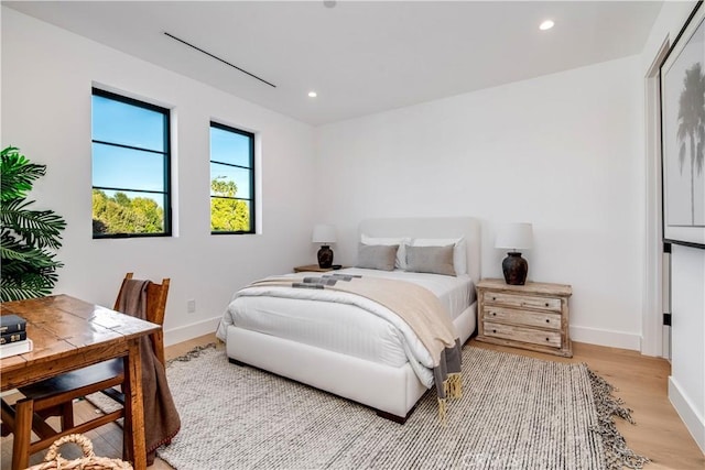 bedroom featuring light wood-type flooring