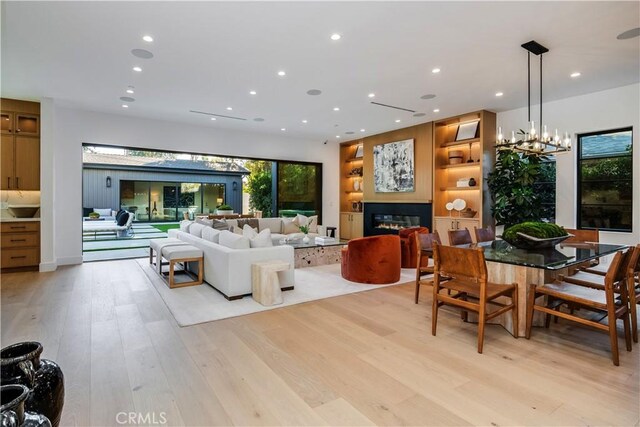 living room with light hardwood / wood-style floors