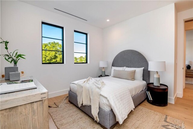 bedroom featuring light hardwood / wood-style flooring