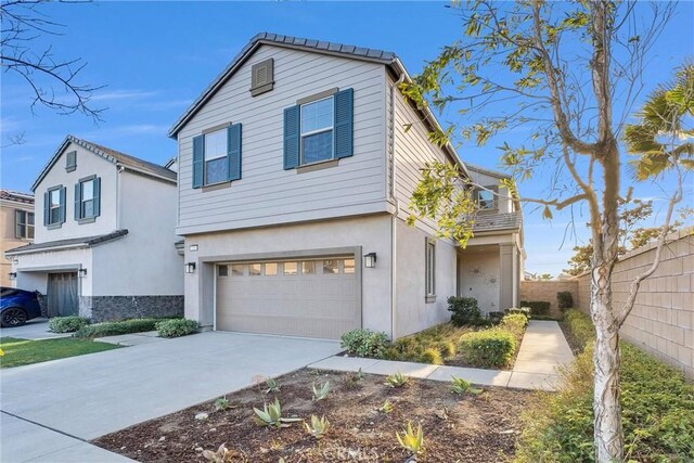 front of property featuring a garage