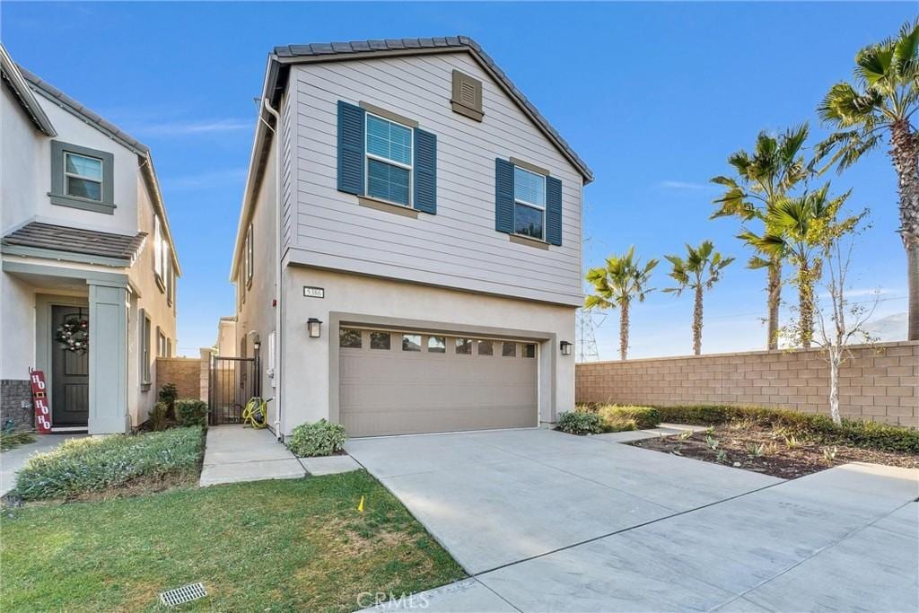 view of front of property with a garage