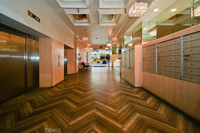 interior space with a mail area and parquet floors