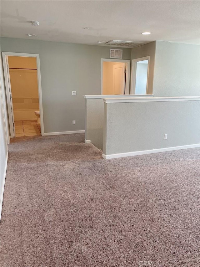 empty room featuring carpet floors