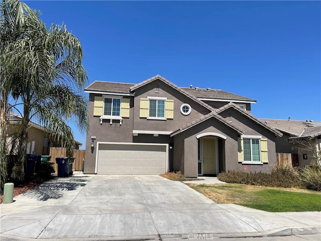 view of front of property featuring a garage