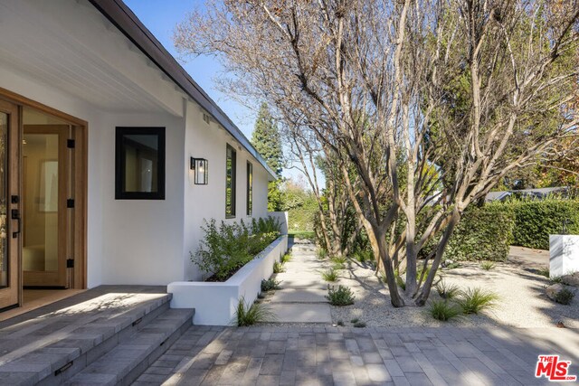 view of home's exterior with a patio area