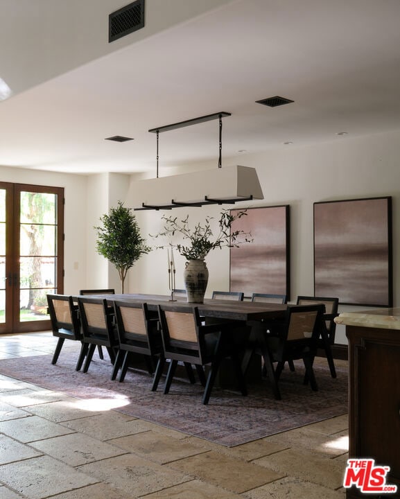 dining area featuring french doors