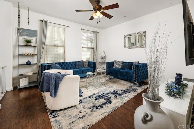 living room with ceiling fan, dark hardwood / wood-style floors, and radiator