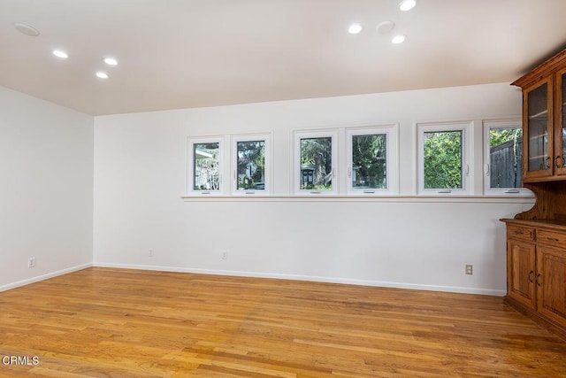 unfurnished room featuring light hardwood / wood-style flooring