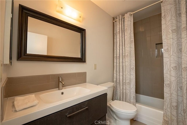 full bathroom with toilet, vanity, and shower / bathtub combination with curtain