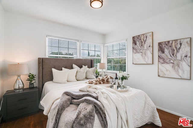 bedroom featuring dark hardwood / wood-style floors