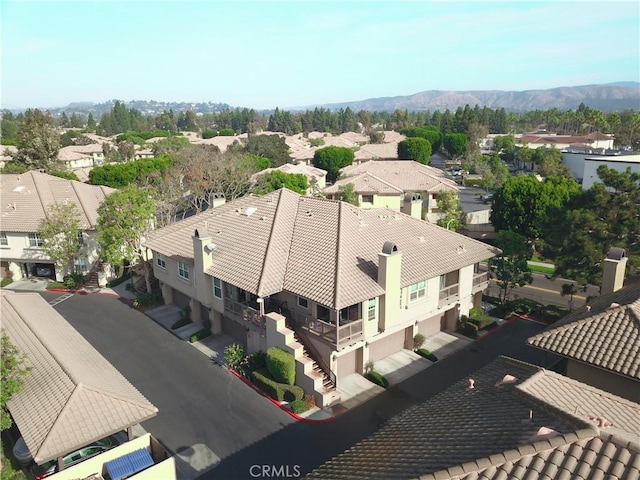 drone / aerial view featuring a mountain view