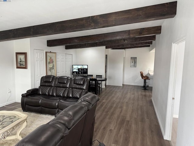 living room with dark wood-type flooring and beam ceiling