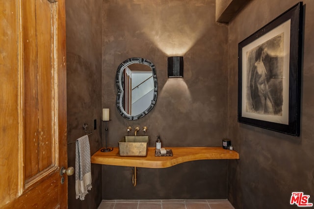 bathroom with sink and tile patterned floors