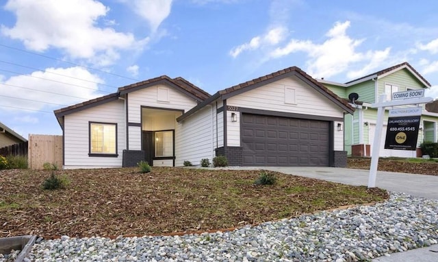 ranch-style home with a garage