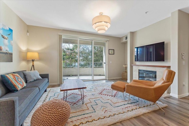 living room with light hardwood / wood-style flooring