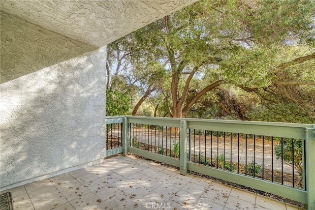 view of patio with a balcony