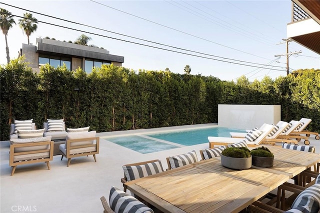 view of pool with a patio