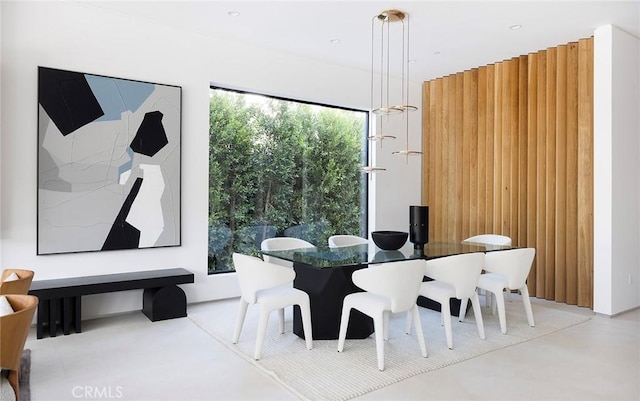 dining room with concrete flooring