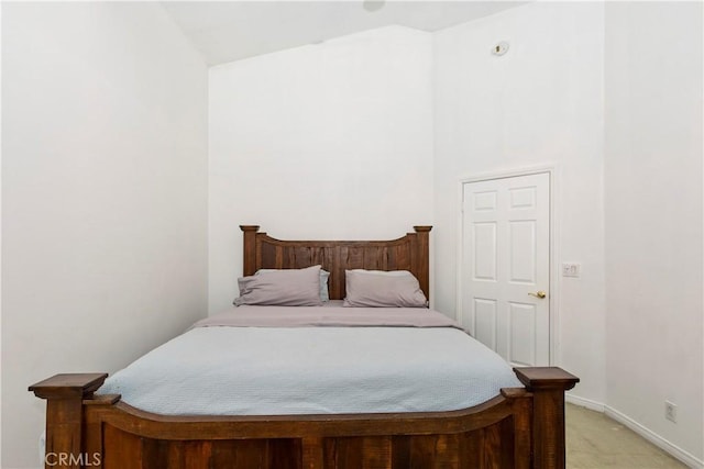 carpeted bedroom featuring vaulted ceiling