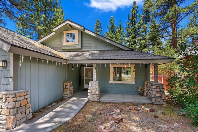 doorway to property with a porch