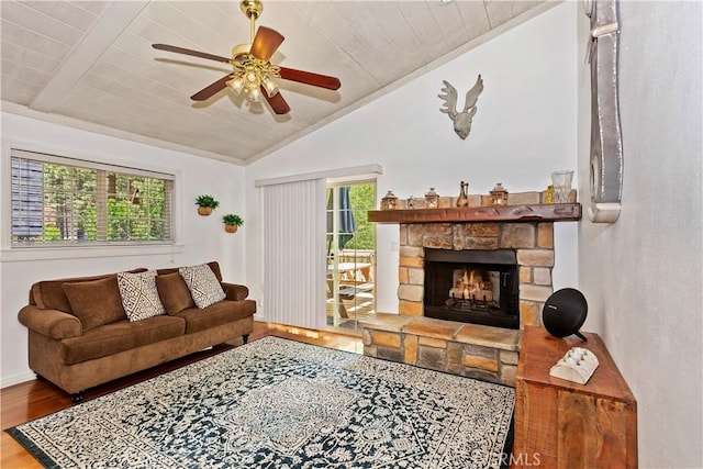 living room with ceiling fan, vaulted ceiling, a fireplace, wood-type flooring, and wood ceiling