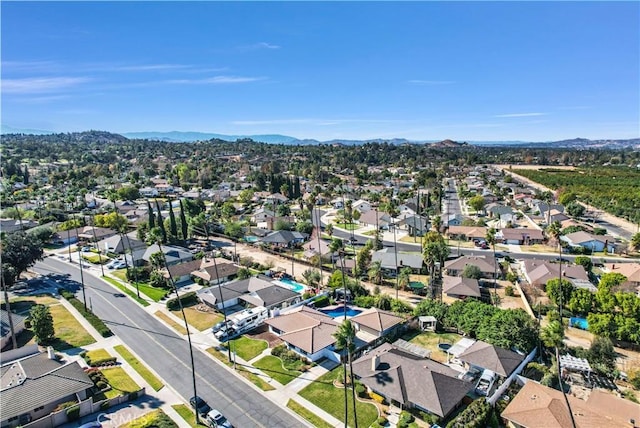 drone / aerial view featuring a mountain view