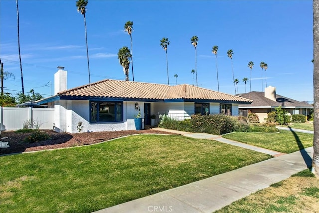 view of front of home with a front yard