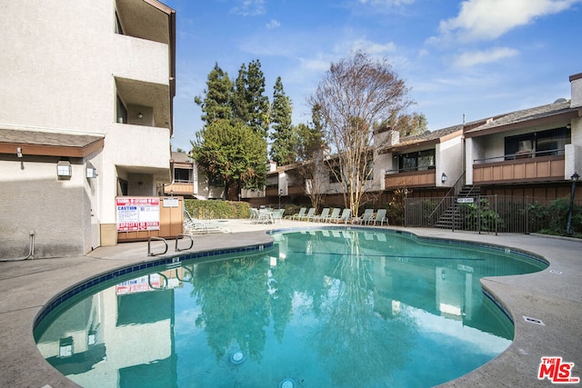 view of pool with a patio area