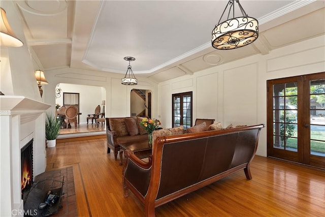 4485 Myrtle Ave, Long Beach, CA 90807 - living room featuring french doors, a decorative wall, and wood finished floors