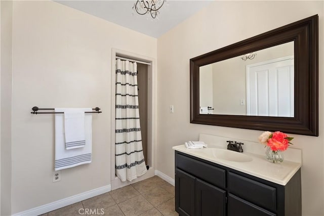 4485 Myrtle Ave, Long Beach, CA 90807 - full bath featuring curtained shower, tile patterned flooring, baseboards, and vanity