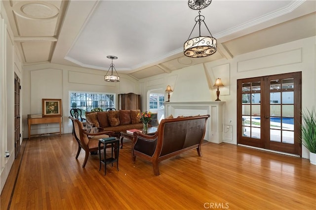 4485 Myrtle Ave, Long Beach, CA 90807 - living area with ornamental molding, french doors, wood finished floors, and a decorative wall