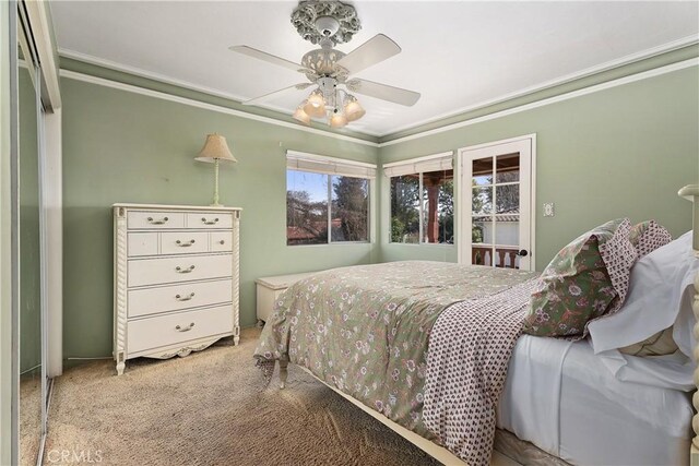 4485 Myrtle Ave, Long Beach, CA 90807 - bedroom with light carpet, a ceiling fan, and crown molding
