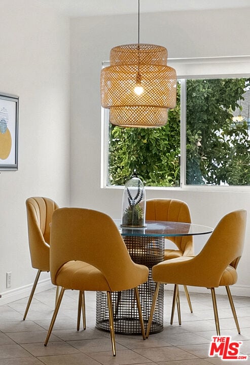 dining space with light tile patterned floors