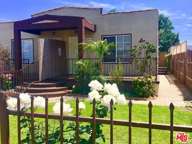 exterior space with a front yard