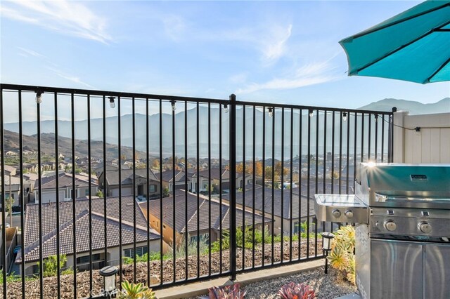 view of gate featuring a mountain view