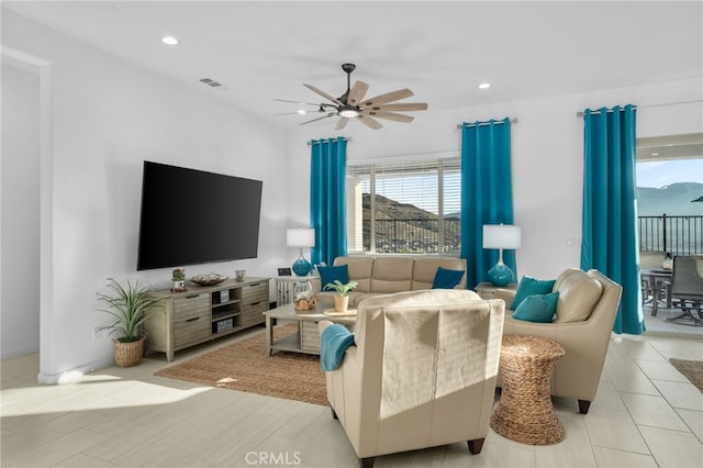 living room featuring ceiling fan