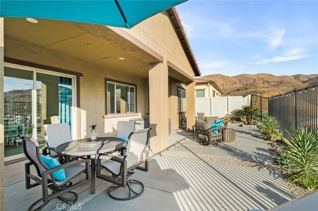 view of patio featuring a mountain view