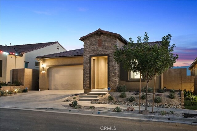 view of front of house with a garage