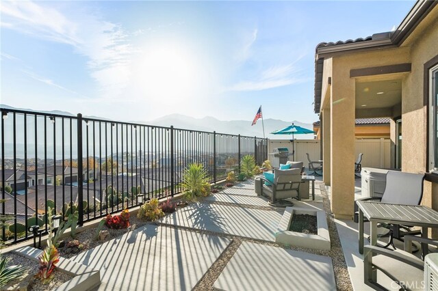 view of patio with a mountain view