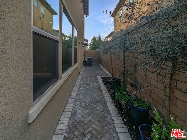 view of home's exterior with central AC unit