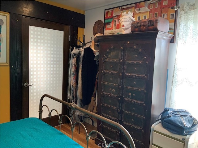 bedroom featuring hardwood / wood-style flooring