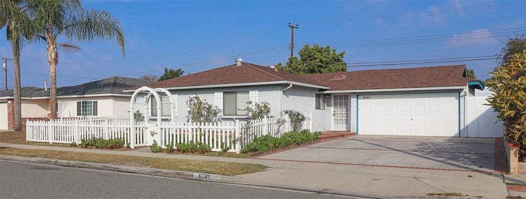 ranch-style home with a garage