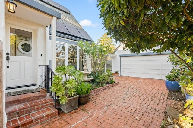 entrance to property with a garage