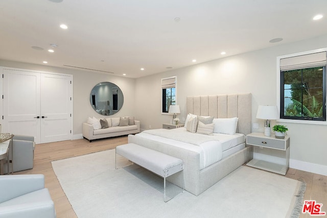 bedroom featuring light hardwood / wood-style flooring